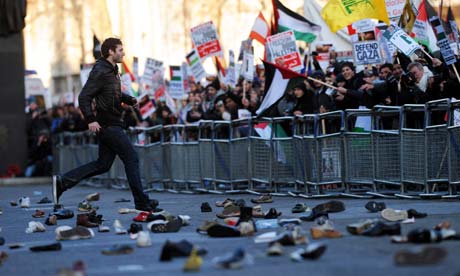 Protestors throw shoes at Downing Street